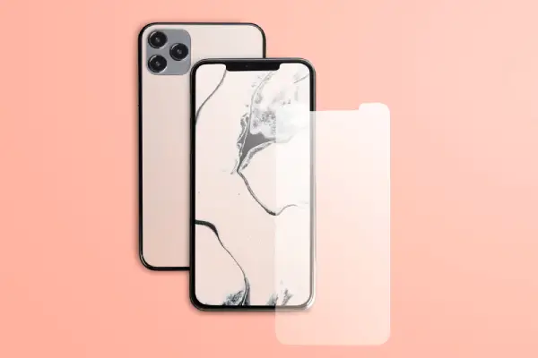 rose-gold-marble-phone-with-blank-screen-peach-background.webp
